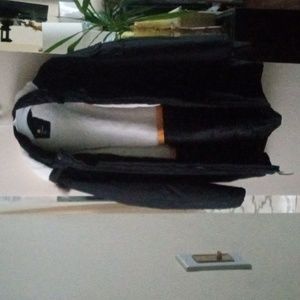 Winter Jacket wind and water repellent has a good and white fur inside